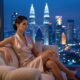Elegant woman in dress with Kuala Lumpur skyline view. Luxury hotel setting.